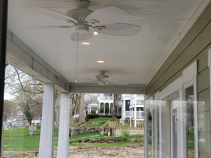 Covered porch ceiling fans and lighting installed by McClone Electric