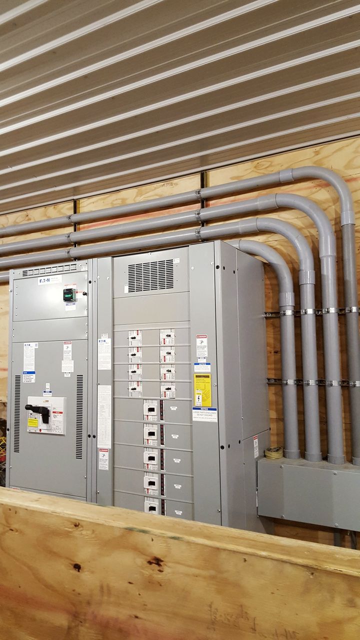 Main distribution switchboard and feeder conduits installed by McClone Electric near Mentone, Indiana
