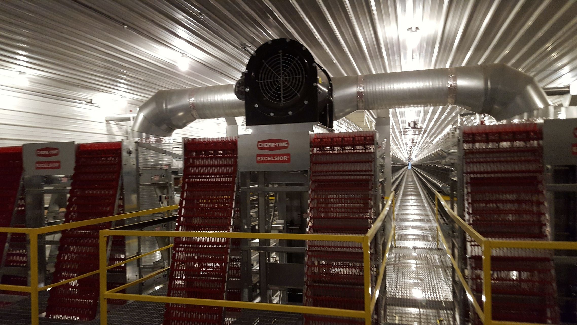Ventilation blower, feed equipment and lighting in a new poultry barn wired by McClone Electric